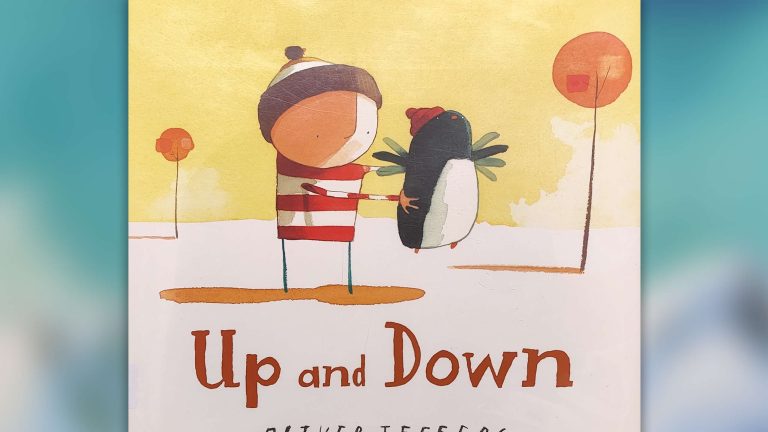 A book cover titled "Up and Down" by Andrea Seuss featuring a penguin standing on a boy's head with colorful illustrations.